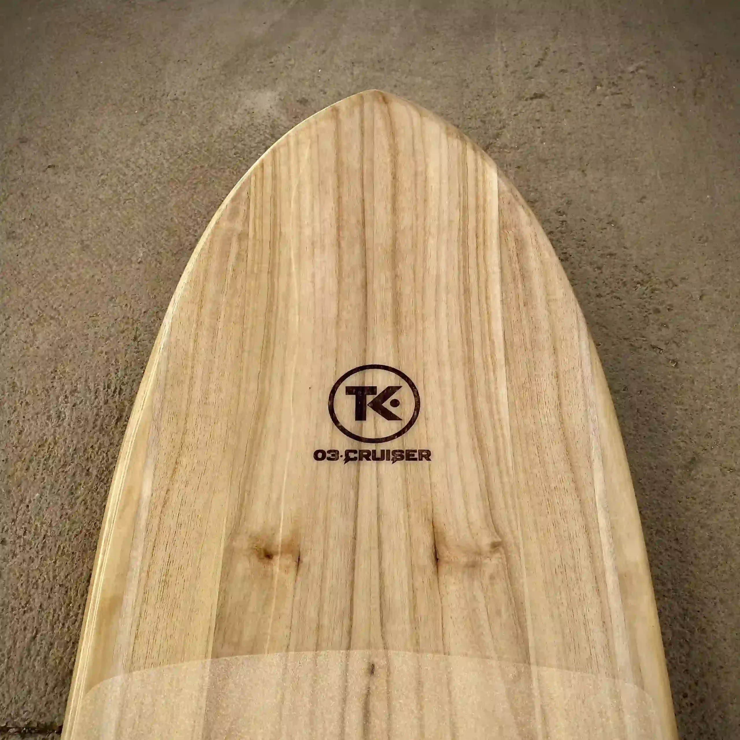 TK·03 Cruiser kiteboard nose with logo engraved on paulownia wood